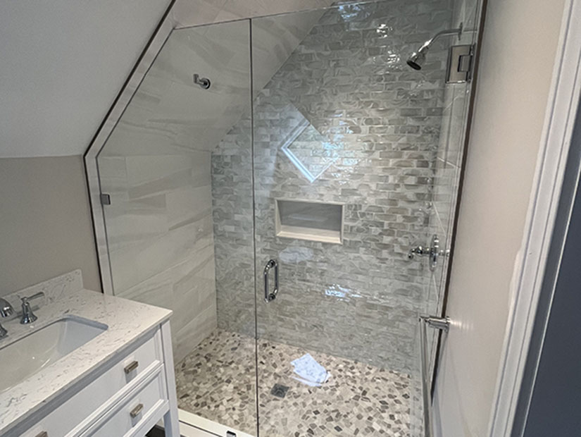 A custom shower door installation by MacNeil Glass